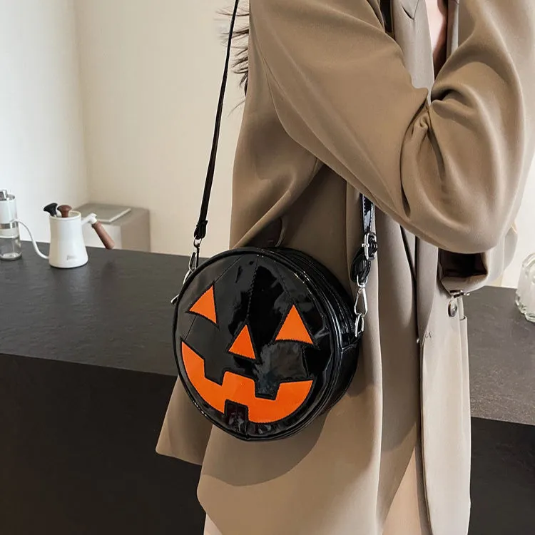 Small round pumpkin-shaped PU shoulder bag in orange for Halloween