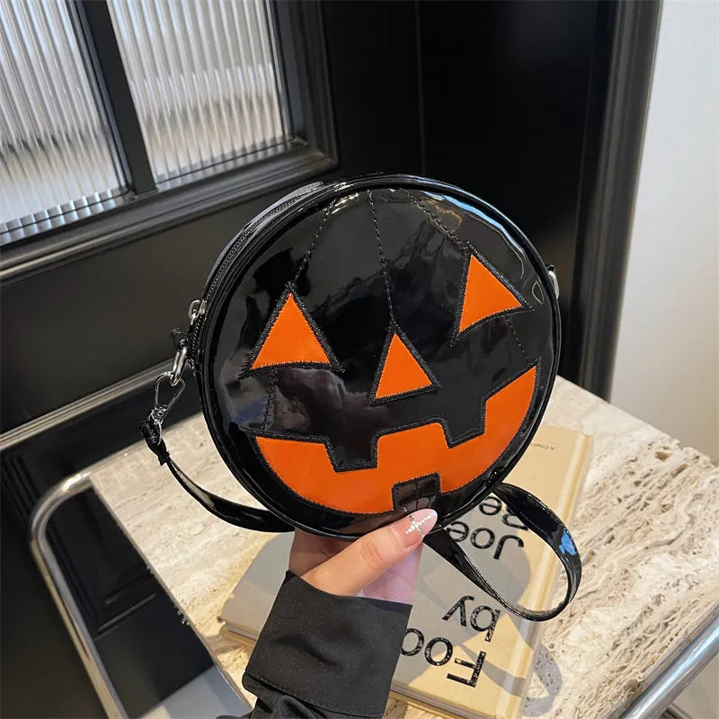 Small round pumpkin-shaped PU shoulder bag in orange for Halloween
