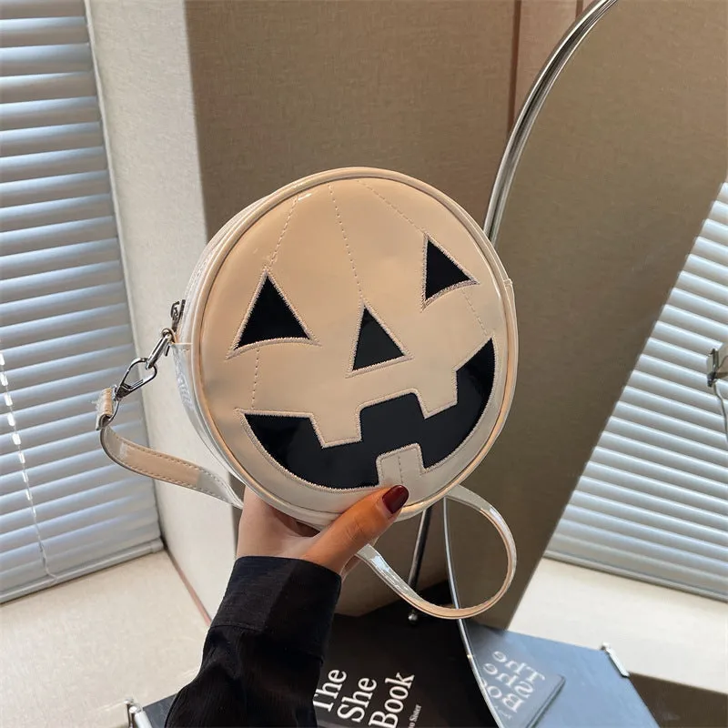 Small round pumpkin-shaped PU shoulder bag in orange for Halloween