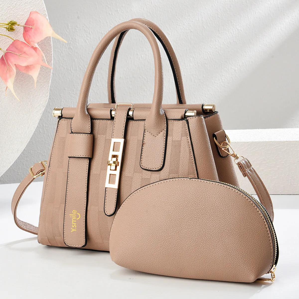 Women's round crossbody shoulder bag in PU material with adjustable strap and polyester lining