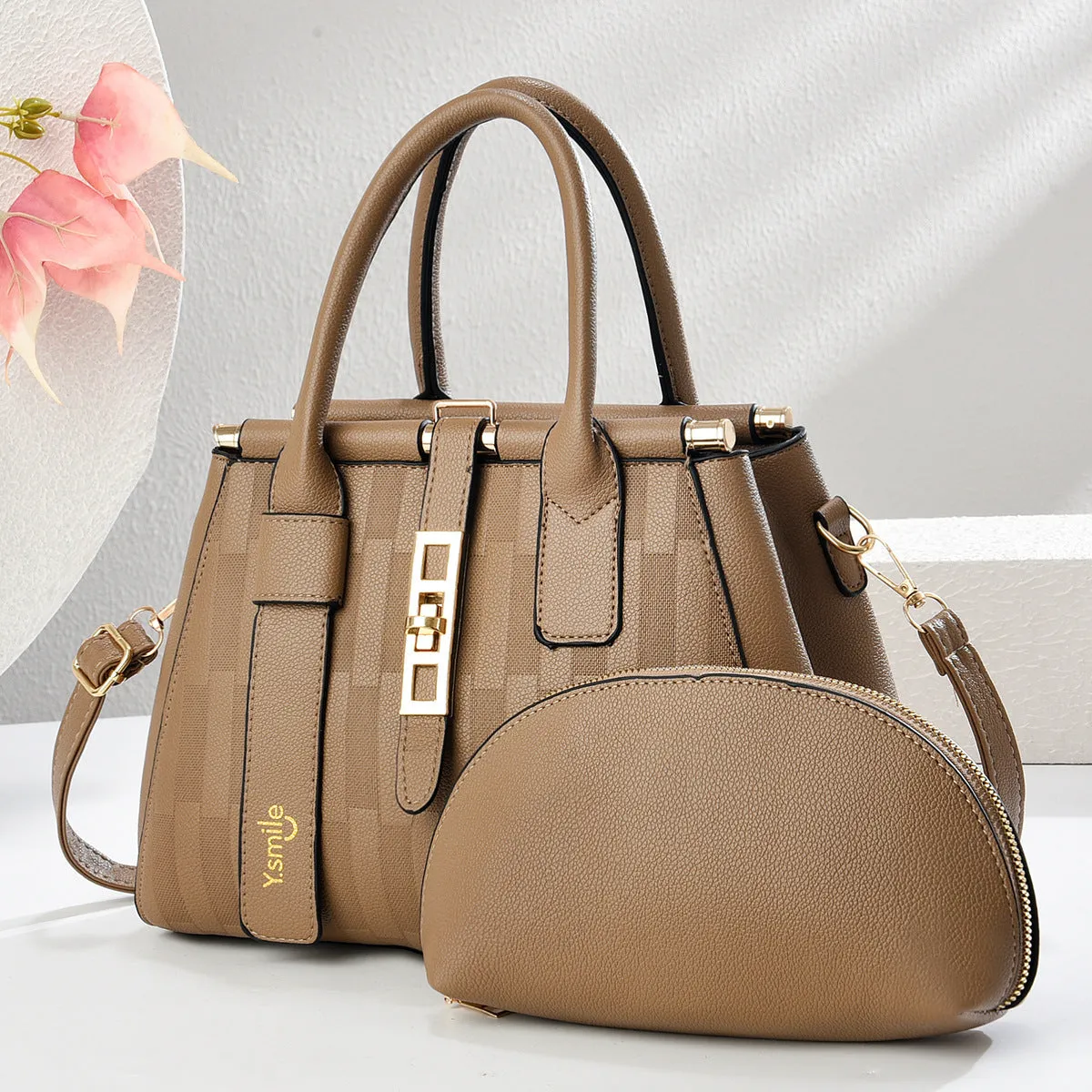 Women's round crossbody shoulder bag in PU material with adjustable strap and polyester lining