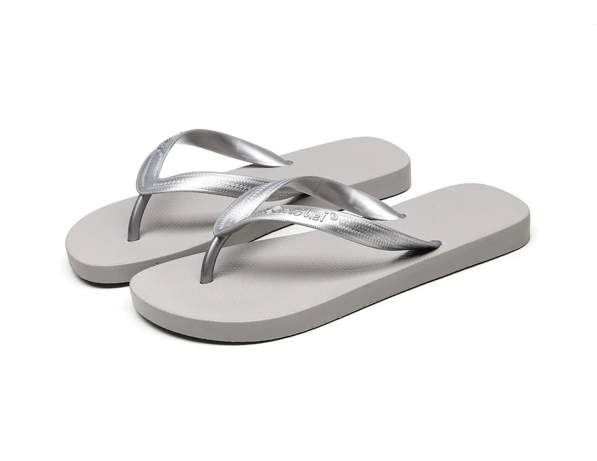 Women's flat bottom solid colour breathable PVC slippers in black, blue, and gray
