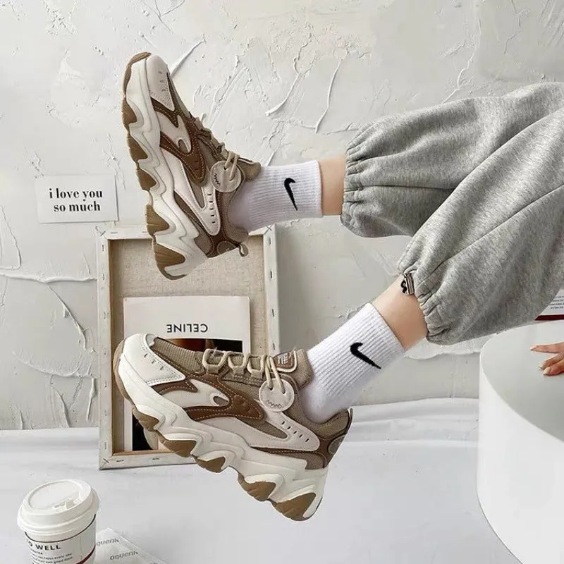 Women's colourblock sneakers with black mesh upper, super high heel, cross shoulder strap, and lace-up closure