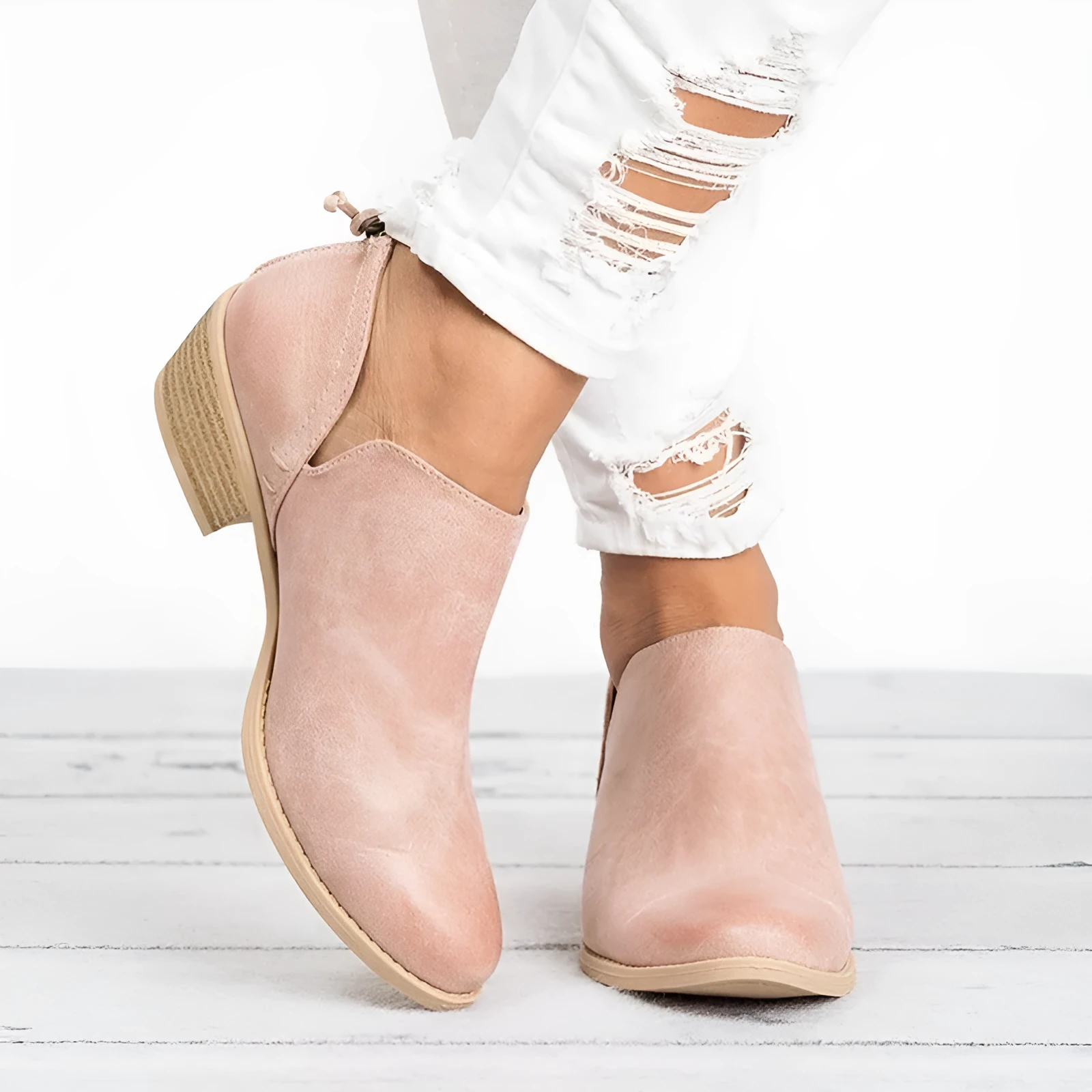 Women's butterfly-knot slip-on ankle boots in faux suede with square heel and pointed toe, available in Beige, Black, and Pink