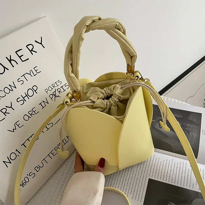 Women's small PU retro bucket bag in apricot with single shoulder strap and soft handle