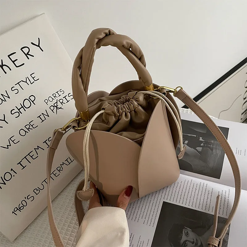 Women's small PU retro bucket bag in apricot with single shoulder strap and soft handle