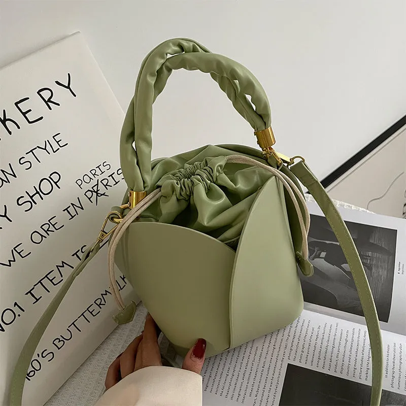 Women's small PU retro bucket bag in apricot with single shoulder strap and soft handle