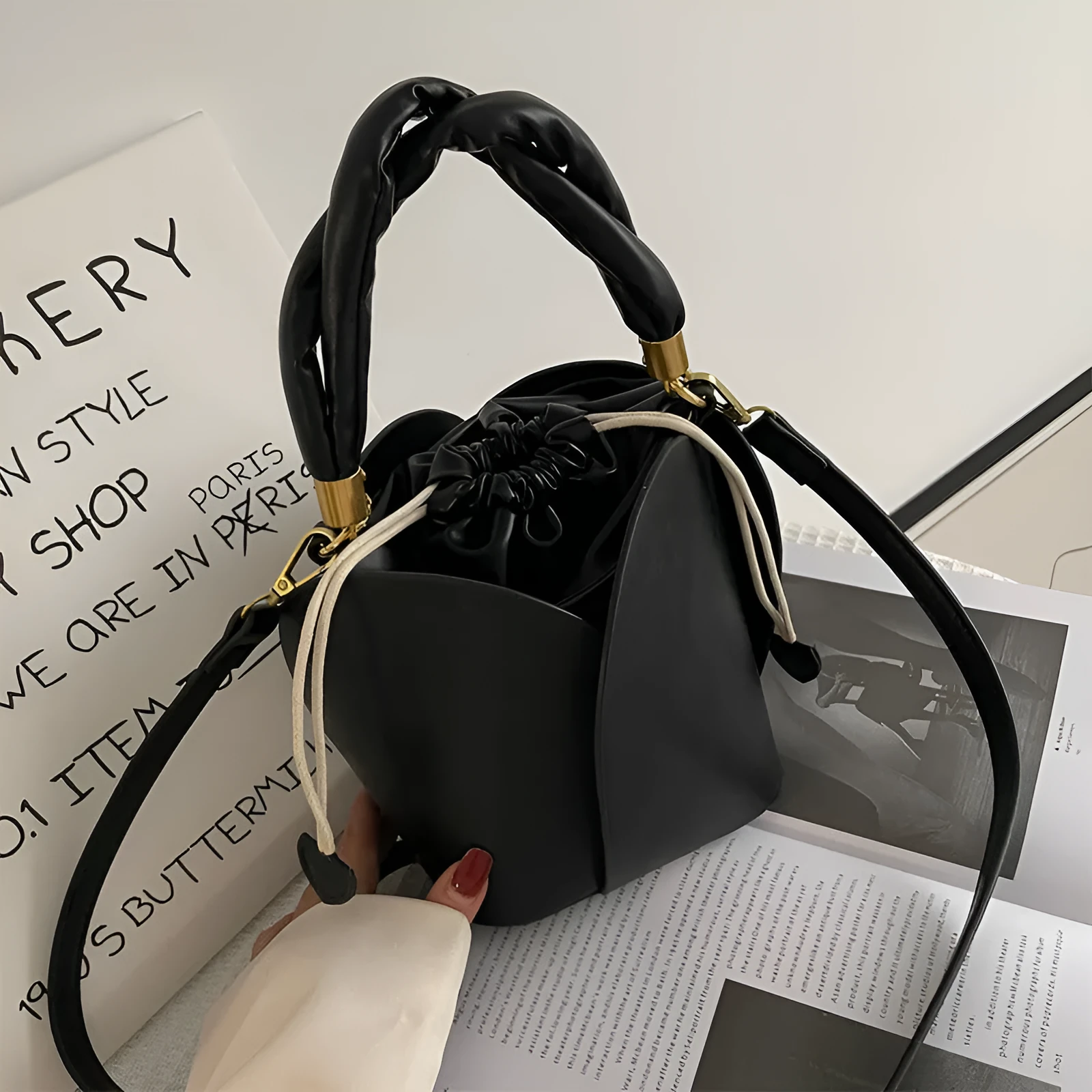 Women's small PU retro bucket bag in apricot with single shoulder strap and soft handle