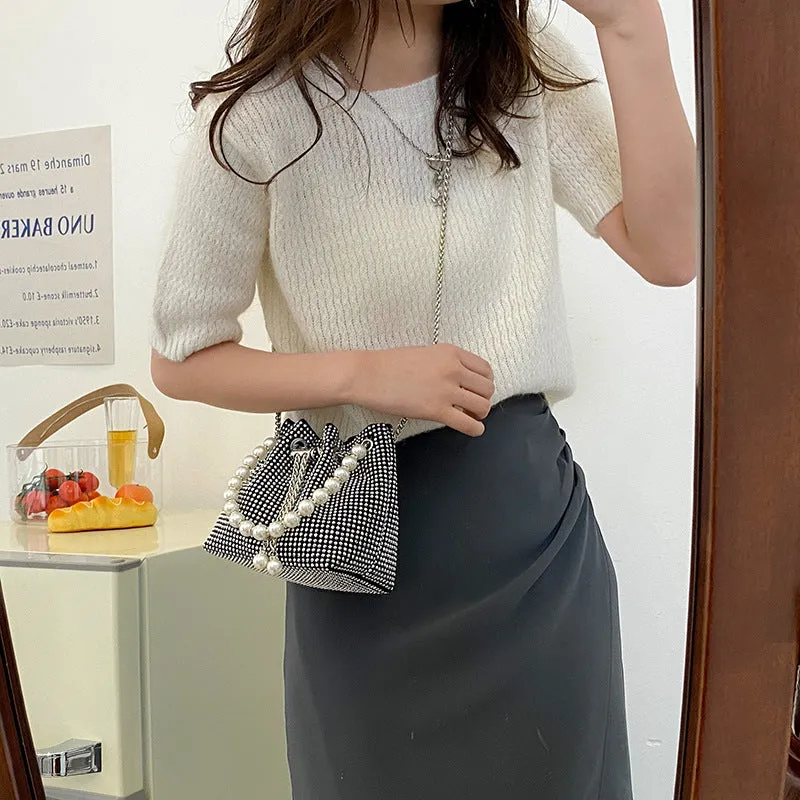 Soft PU leather crossbody bucket bag with diamond decorations and a chain shoulder strap.