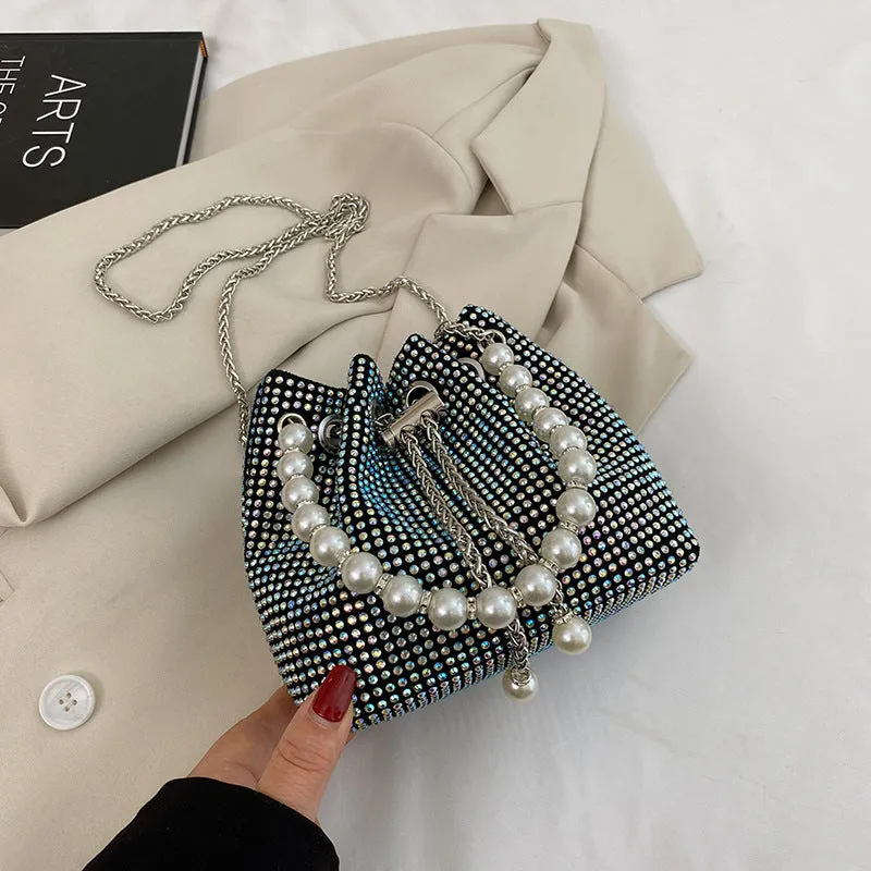 Soft PU leather crossbody bucket bag with diamond decorations and a chain shoulder strap.