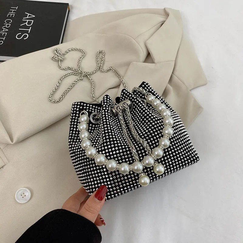 Soft PU leather crossbody bucket bag with diamond decorations and a chain shoulder strap.