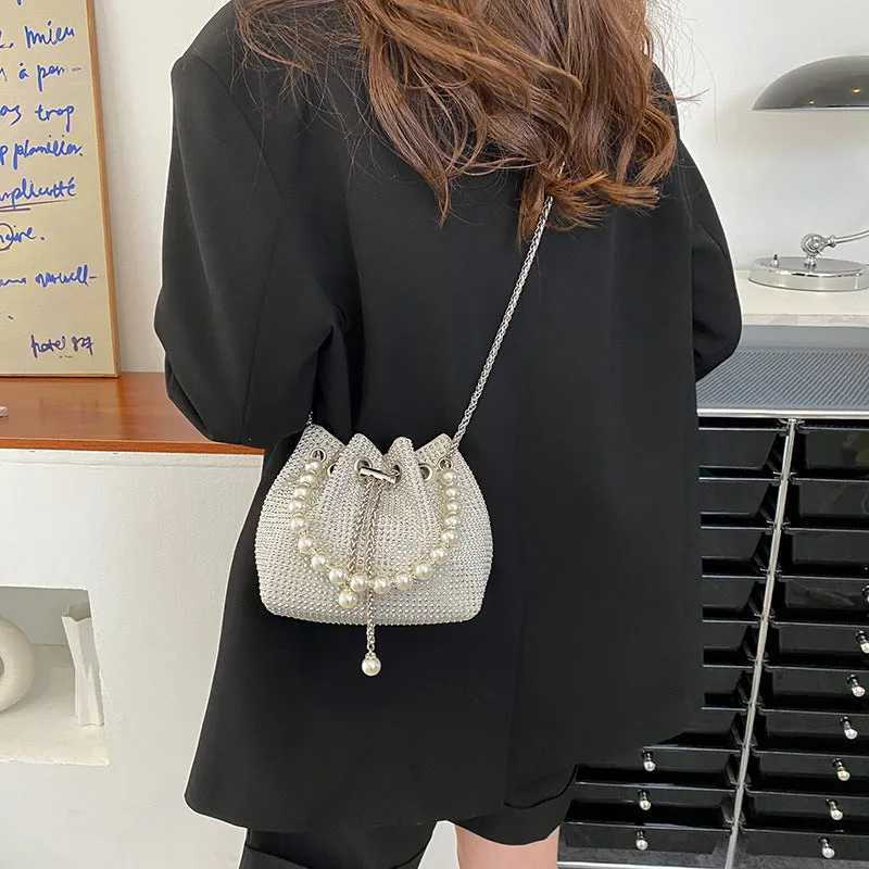 Soft PU leather crossbody bucket bag with diamond decorations and a chain shoulder strap.