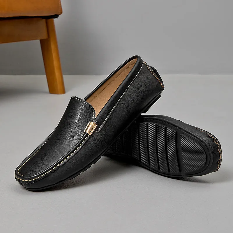 Men's driving shoes in black with matte leather finish, round toe, and flat wedge heel