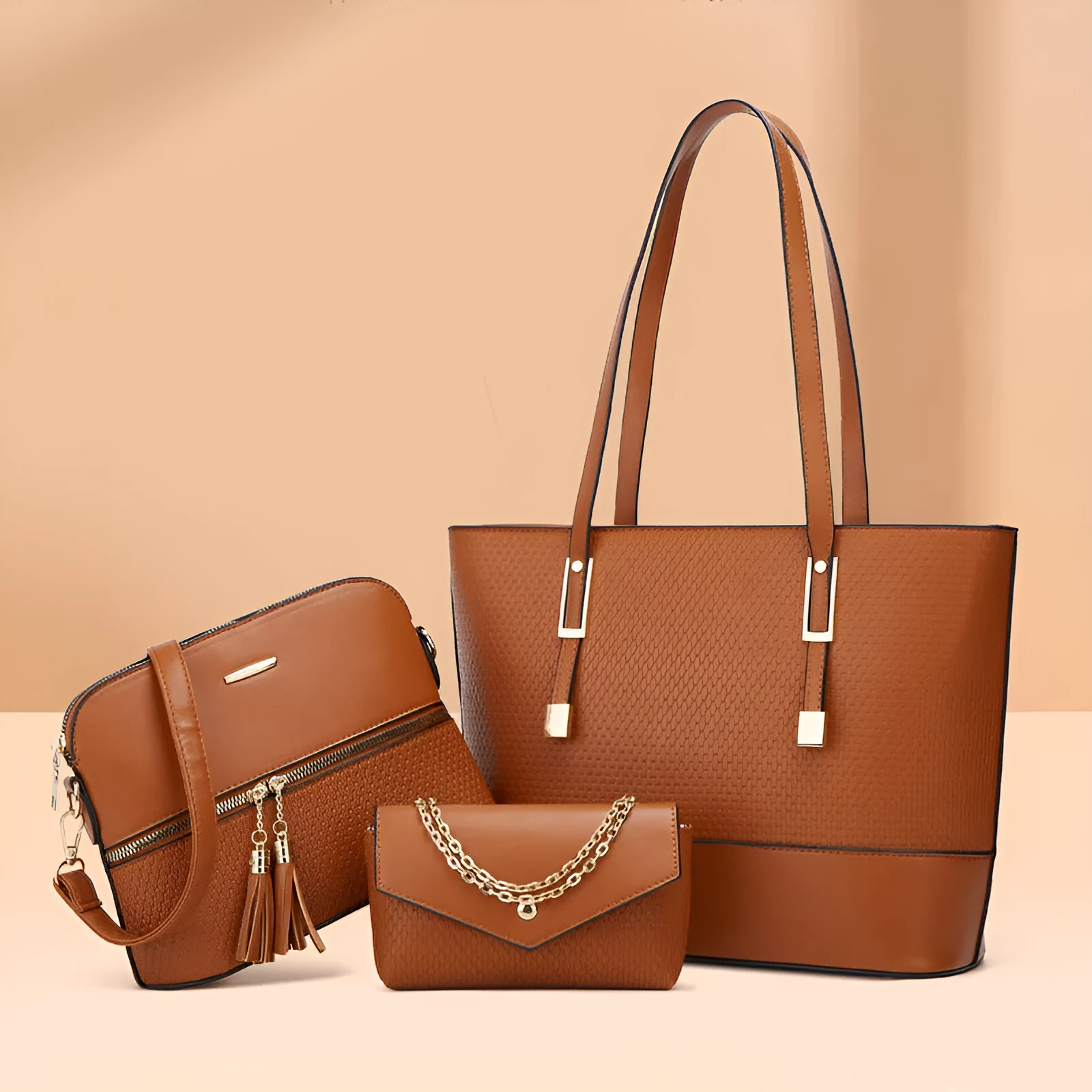 Three women's shoulder bags in black, brown, and light gray colours with folding design and PU material
