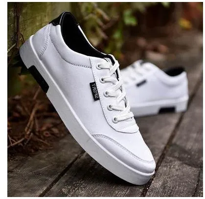 Men's Korean-style low-top canvas shoes, lace-up closure, rubber sole, plain pattern with car suture detail, available in sizes 39-44