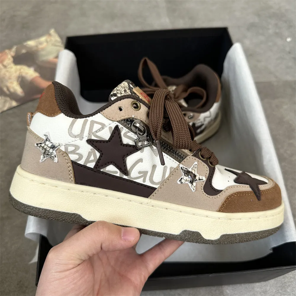 Brown candy colour low-top sneakers with rubber sole and lace-up front on a neutral background