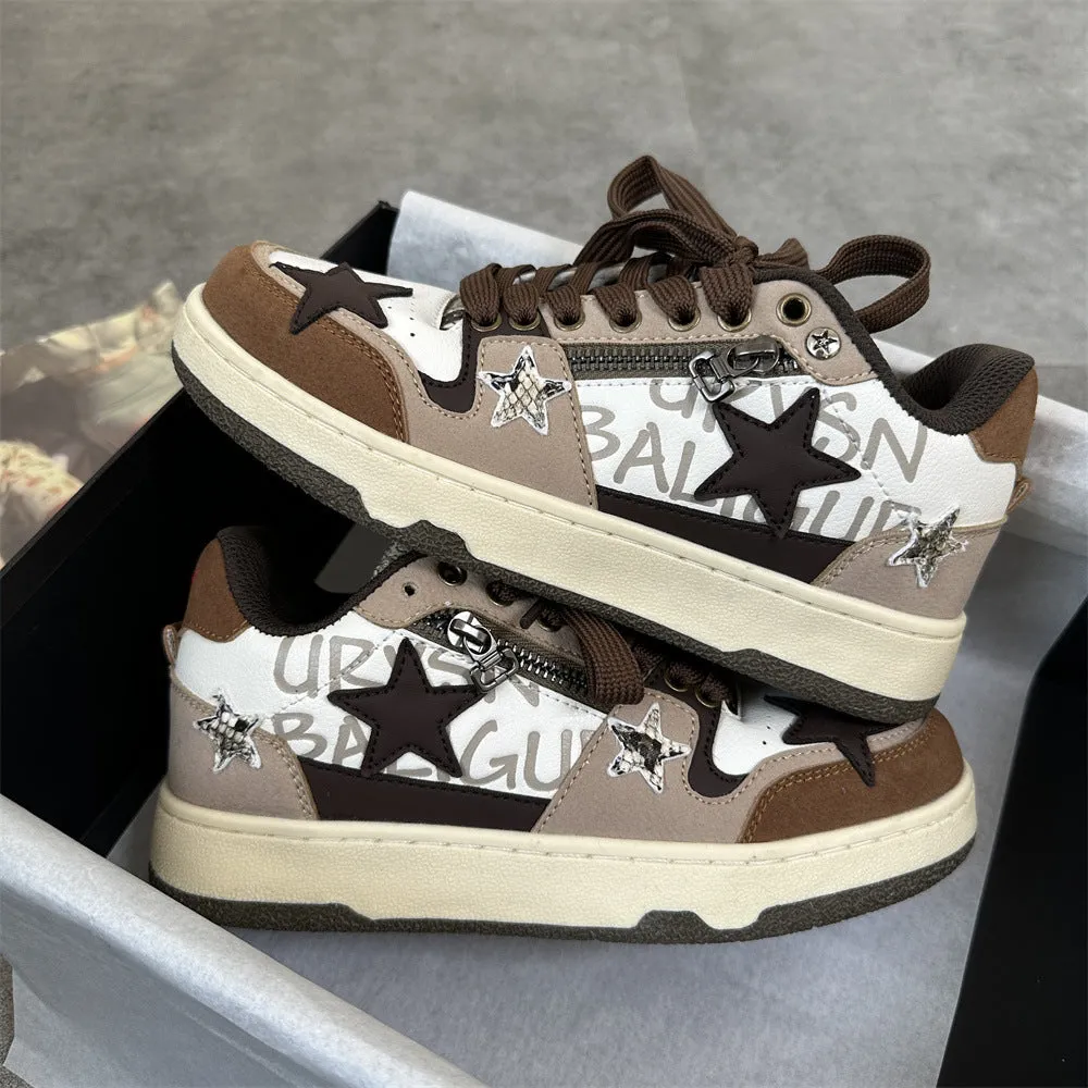 Brown candy colour low-top sneakers with rubber sole and lace-up front on a neutral background