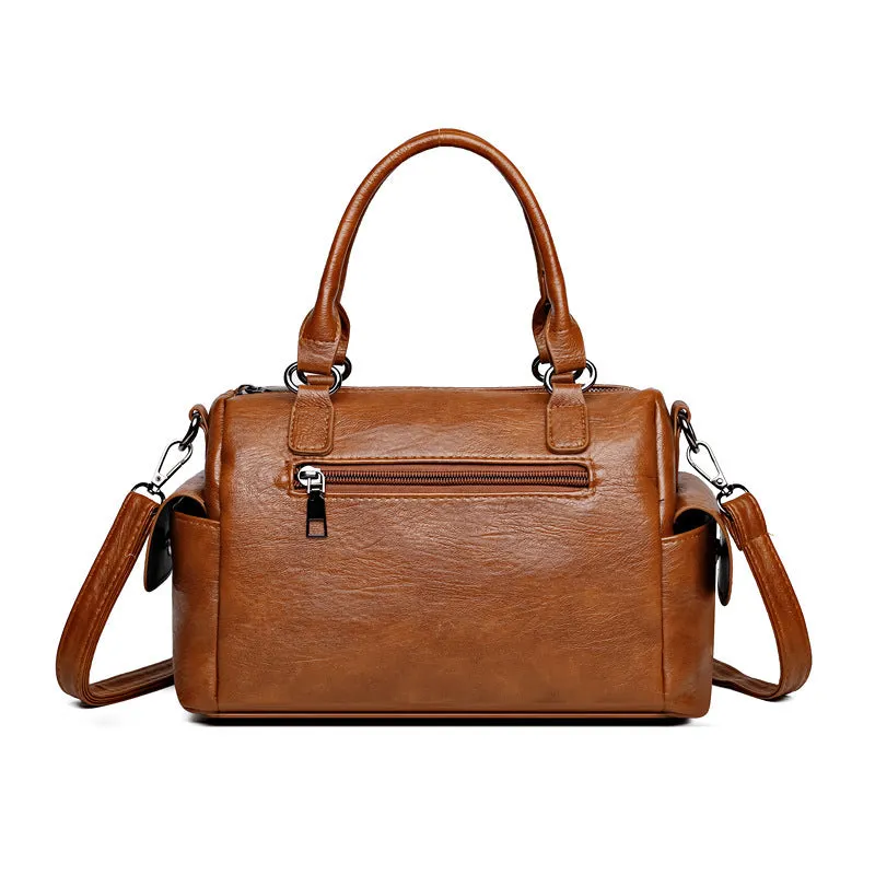 Vintage-style square messenger bag in PU leather with contrast stitching, shown in multiple colour options.