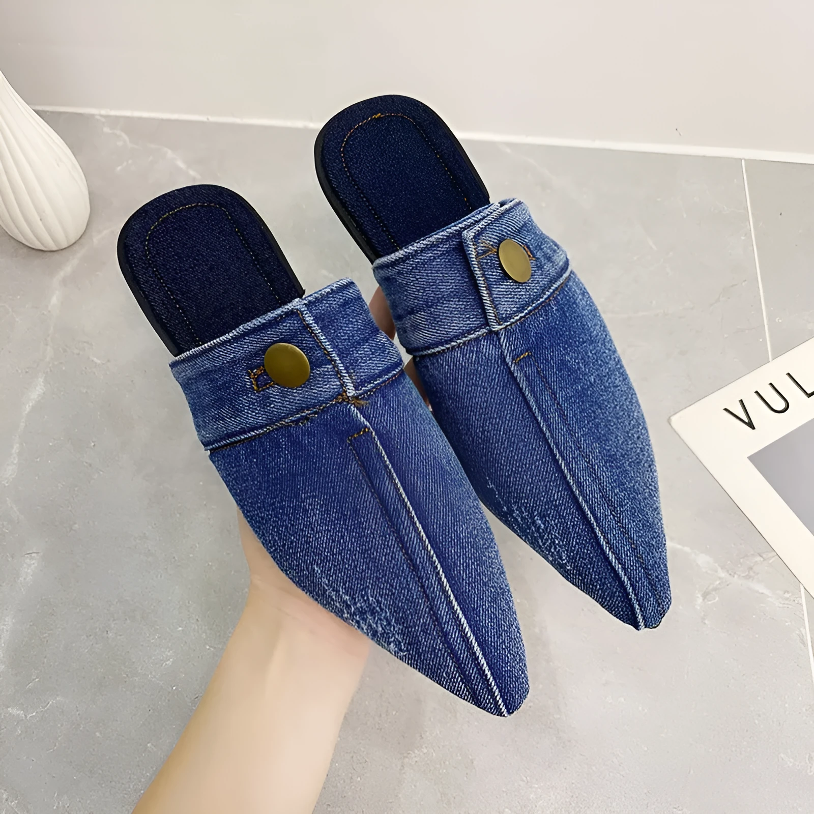 Women's washed denim flat closed toe slippers in light blue with canvas upper and rubber sole