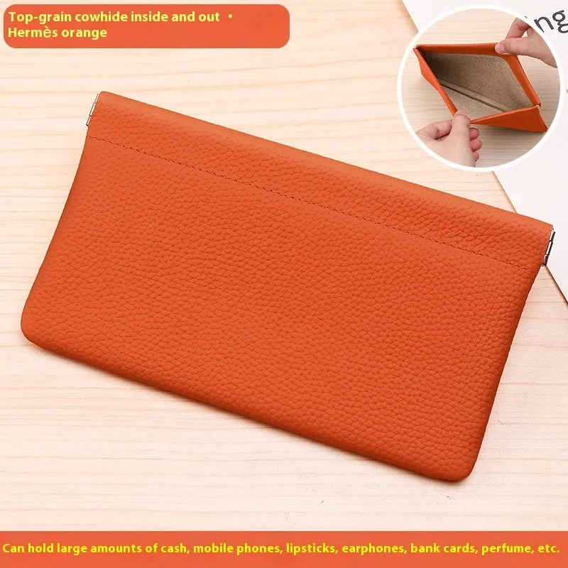 Self-closing first layer cowhide long wallet in solid colour with genuine leather finish