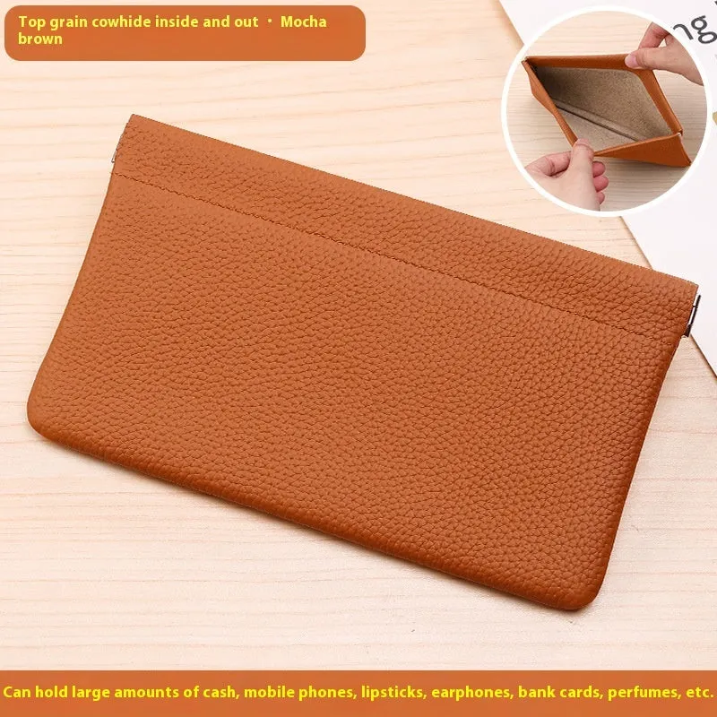 Self-closing first layer cowhide long wallet in solid colour with genuine leather finish