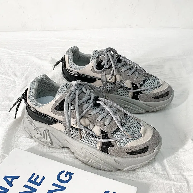 Men's white Korean-style platform dad shoes with thick sole and lace-up front on a plain background