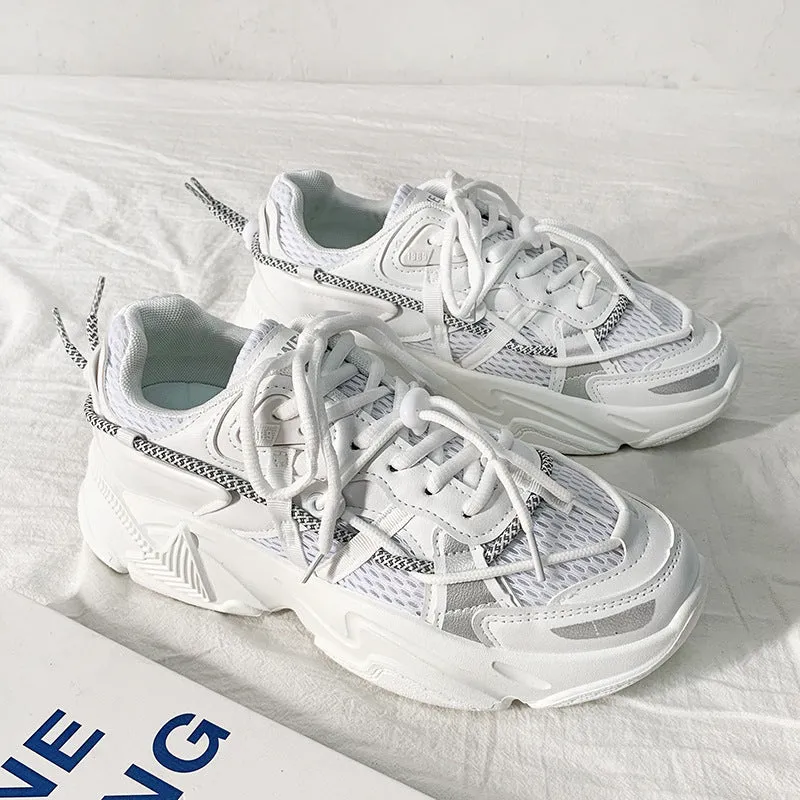 Men's white Korean-style platform dad shoes with thick sole and lace-up front on a plain background