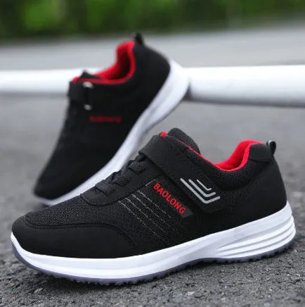 Breathable mesh walking shoes for elderly with non-slip soft sole in black, unisex lace-up design