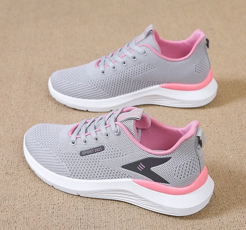 Low-top women's casual running shoes in beige with mesh upper, round toe, and front lace-up closure