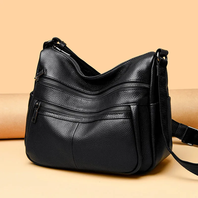 First layer cowhide genuine leather pillow-shaped shoulder messenger bag in black, small size