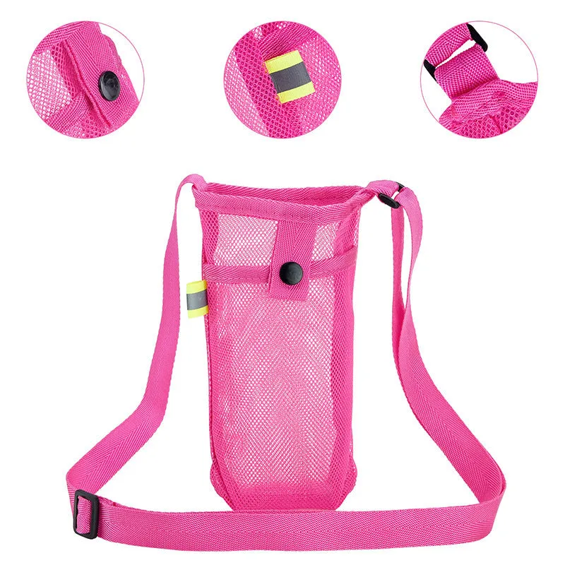 Nylon water bottle holder in black with adjustable shoulder strap on a beach setting