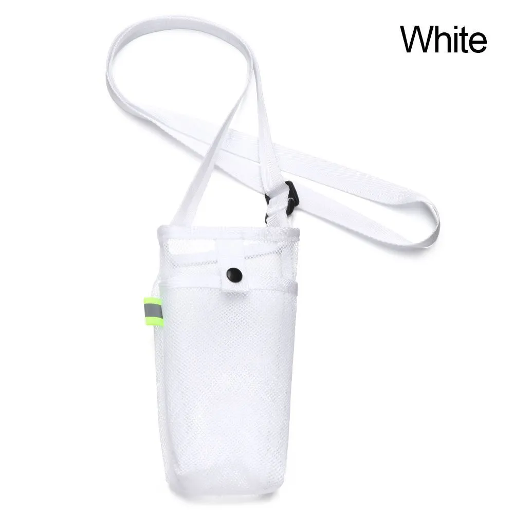 Nylon water bottle holder in black with adjustable shoulder strap on a beach setting