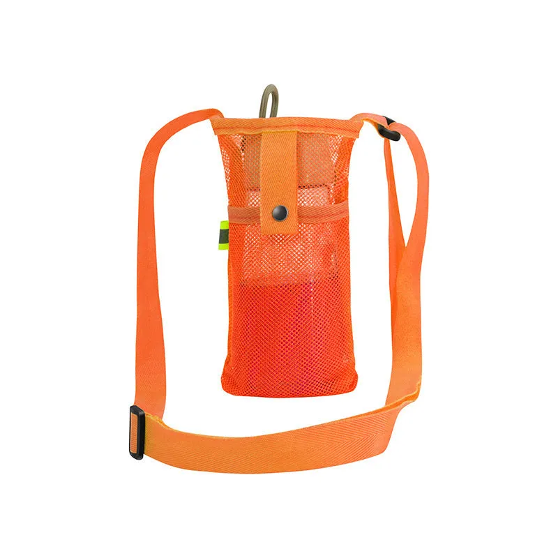 Nylon water bottle holder in black with adjustable shoulder strap on a beach setting