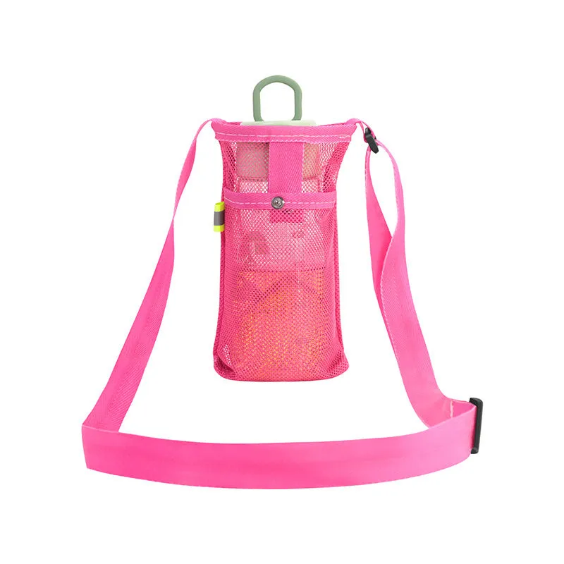 Nylon water bottle holder in black with adjustable shoulder strap on a beach setting