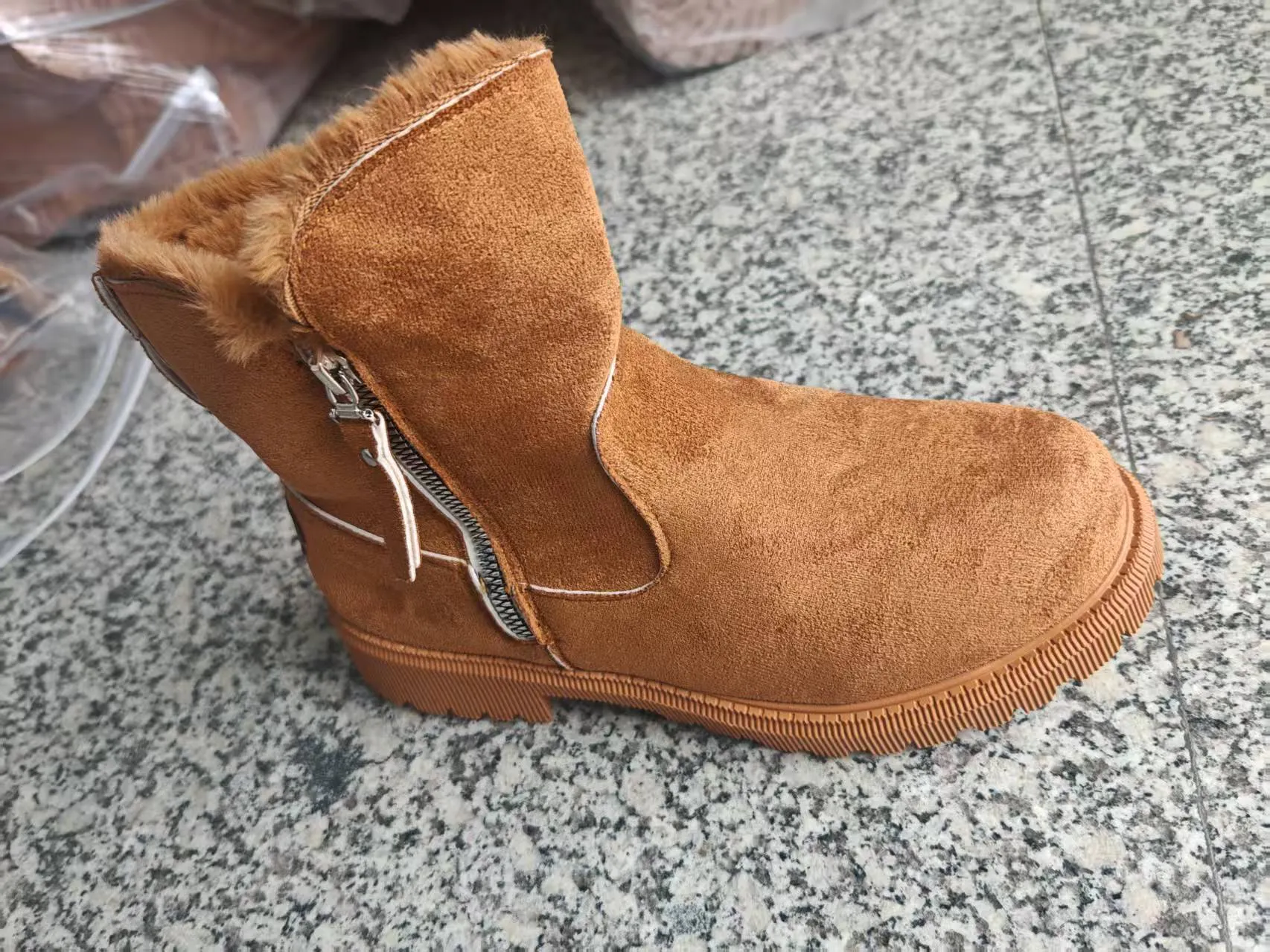 Women's cotton-lined snow boots with side zipper and non-slip sole in black, khaki, and light brown