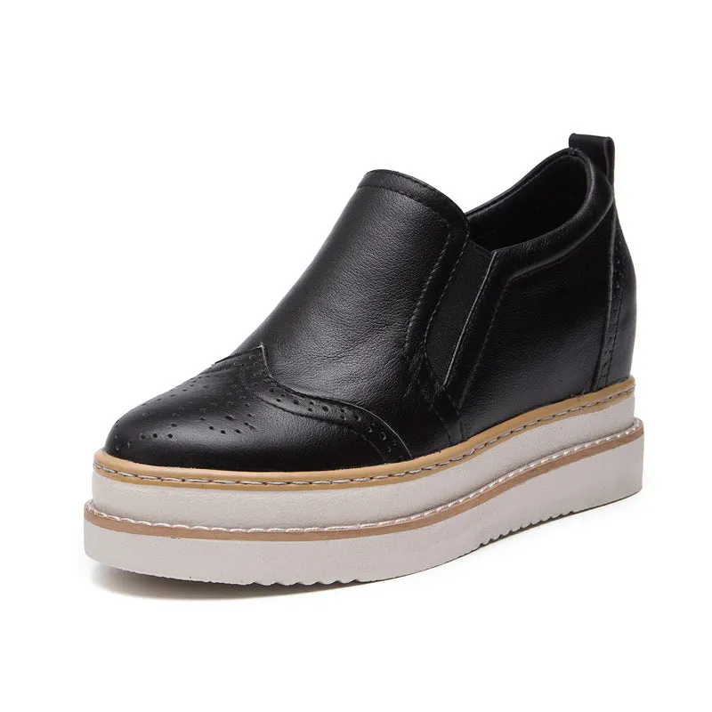 Women's genuine leather brogue platform shoes with metal detail and round toe in black
