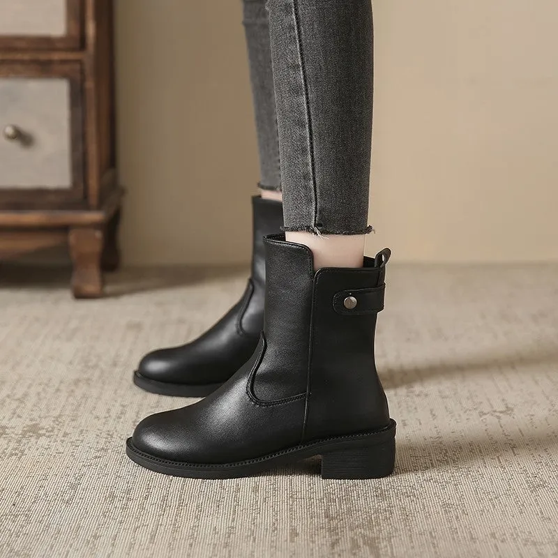 Women's black low heel round toe side zip ankle boots showing front and side views