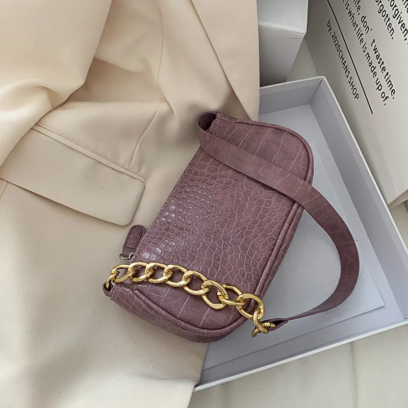 Retro women's shoulder baguette bag in PU leather with car suture detail and zipper closure