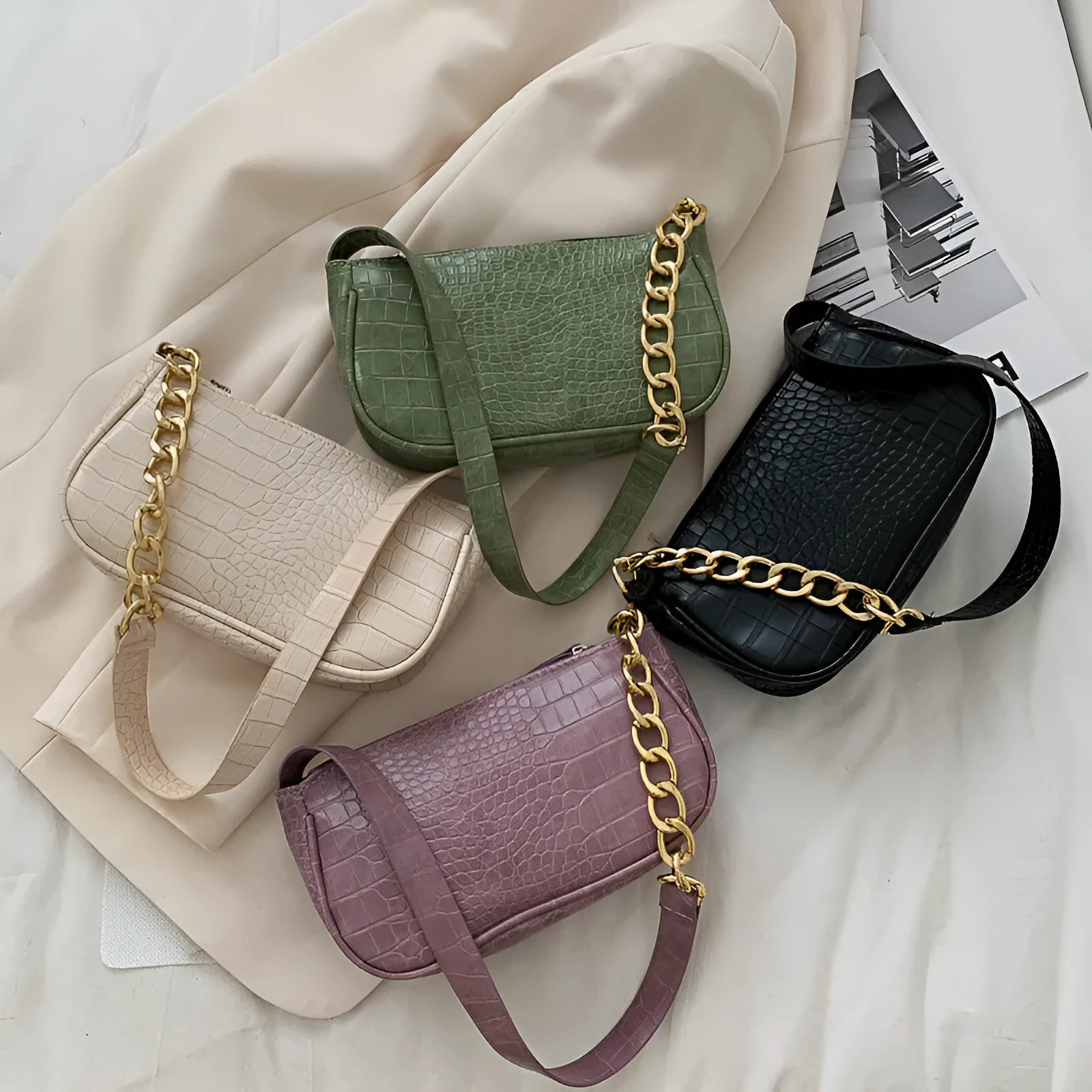 Retro women's shoulder baguette bag in PU leather with car suture detail and zipper closure