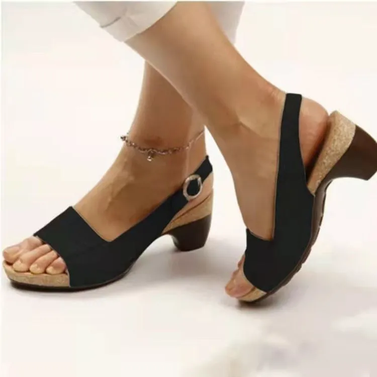 Women's ankle strap sandals in low heel peep toe style with buckle fastening, synthetic leather upper, multiple colours available