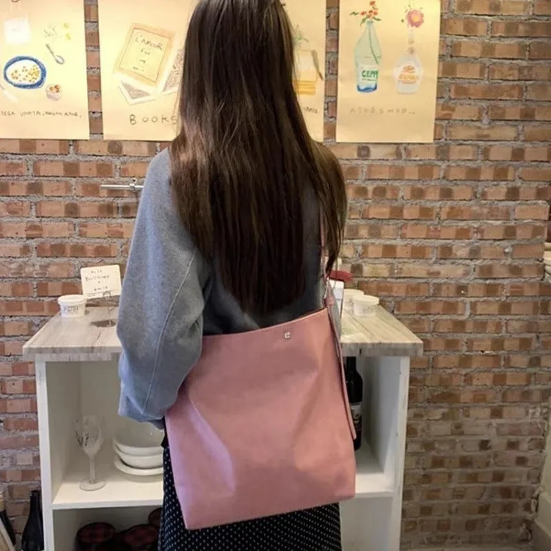 Corduroy one-shoulder bag in pink or brown showing dimensions and PU lining interior