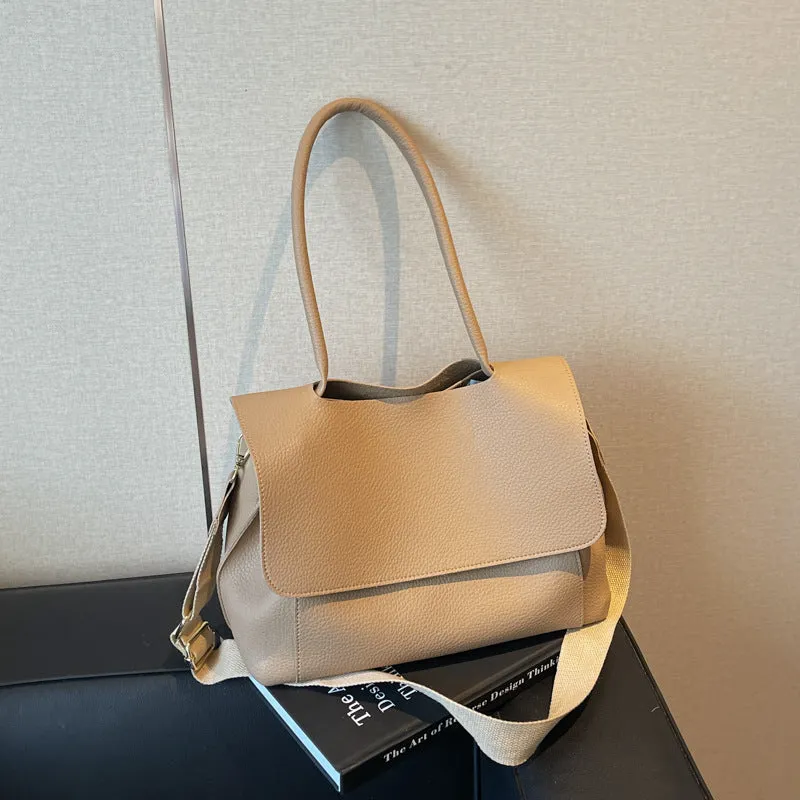 Vintage style square tote bag in PU leather-look material with visible stitching detail.
