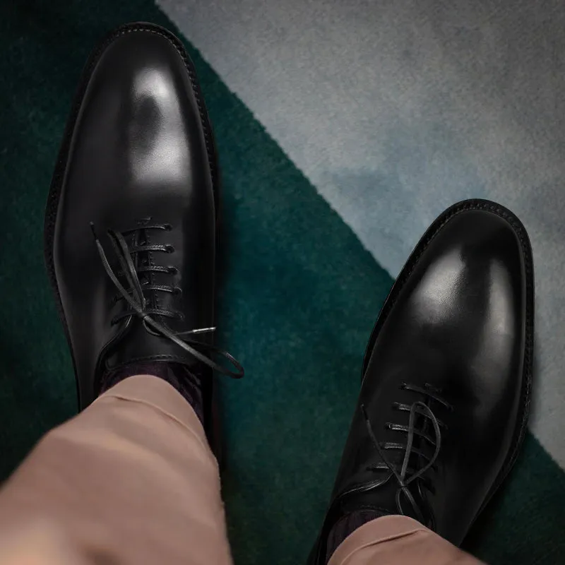 Shoesmen's handmade black formal leather oxfords with lace-up closure and round toe, genuine cowhide upper