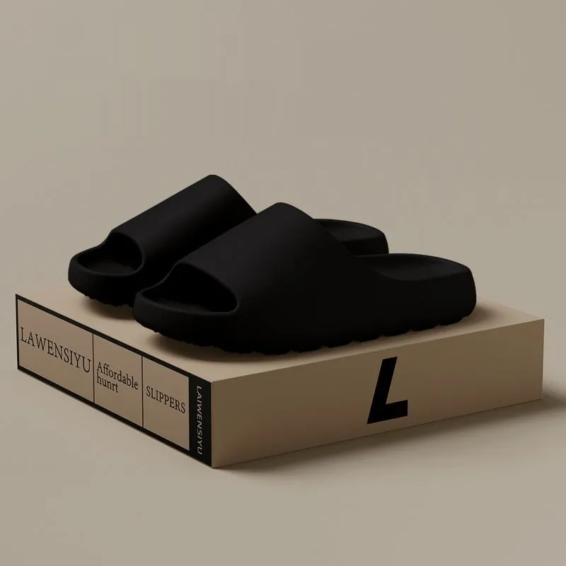 Women's thick-soled EVA beach slippers in beige, shown on a sandy background.