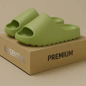 Women's thick-soled EVA beach slippers in beige, shown on a sandy background.