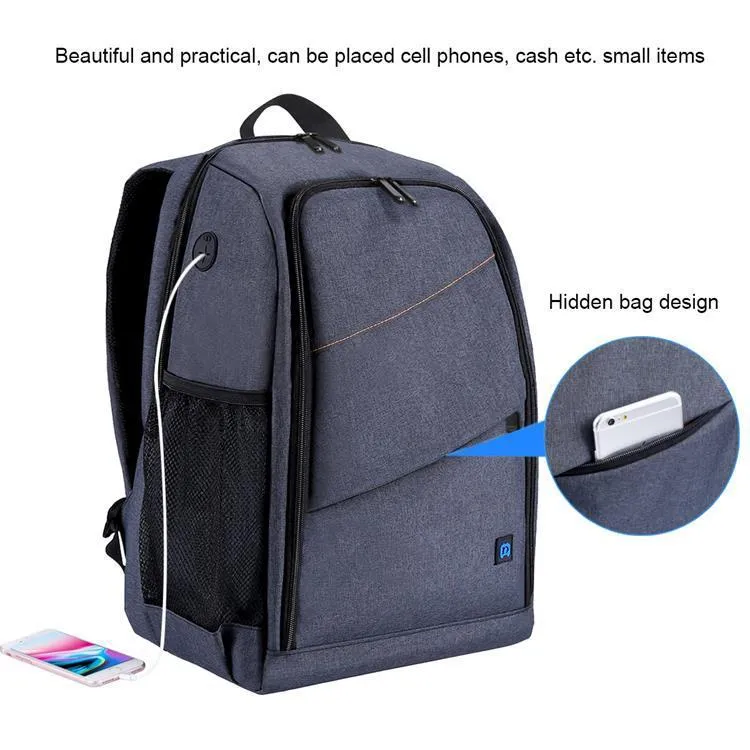 Black cotton outdoor photography mountaineering bag 20L with straps on a rocky hiking trail