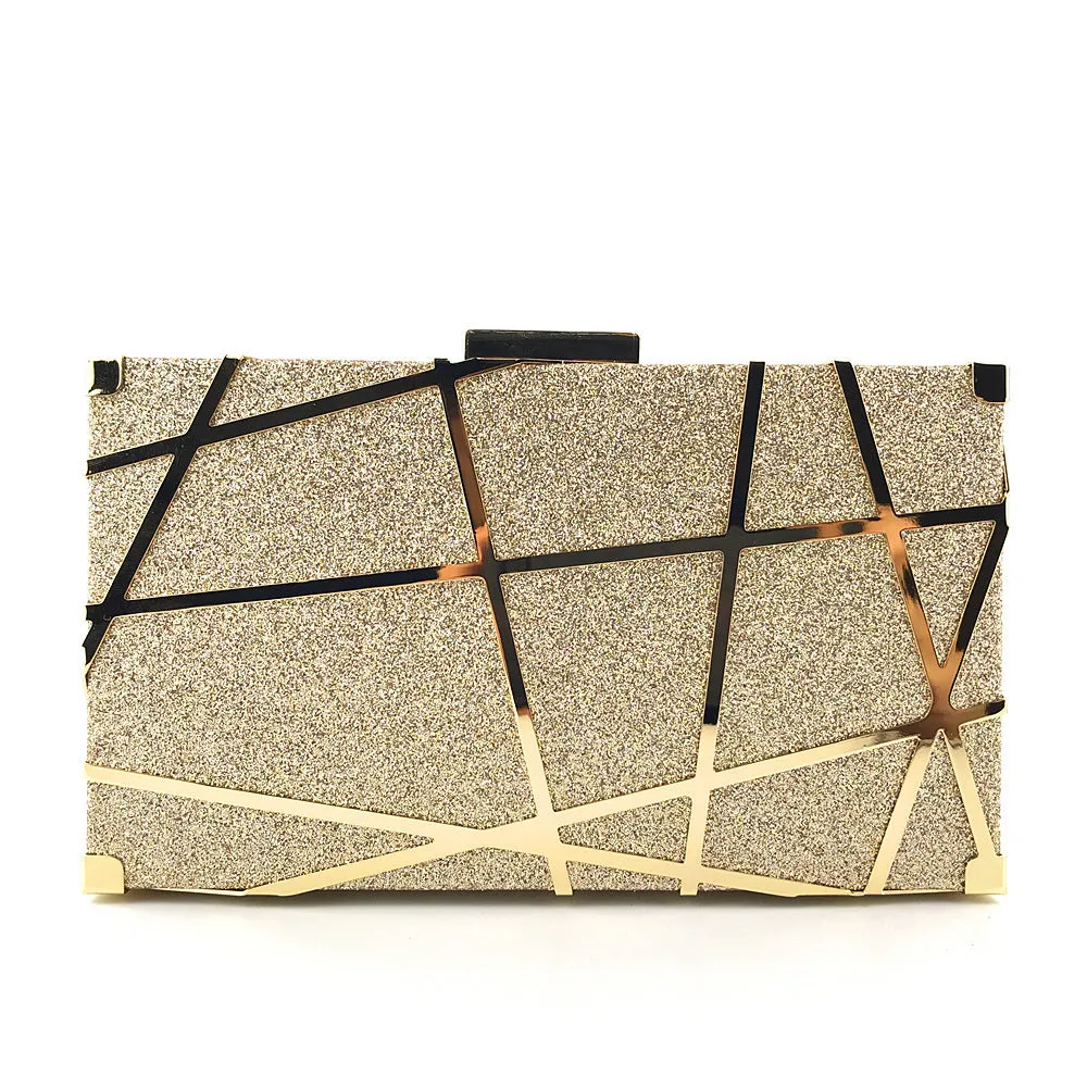 Women's small square glitter chain shoulder bag with lock closure, gold colour, on display