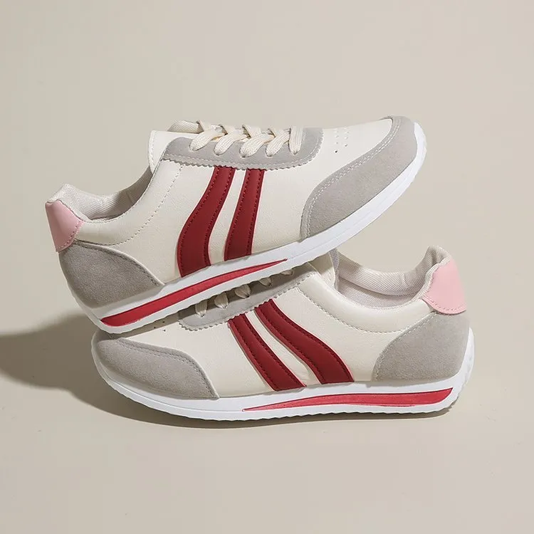 Red and blue lace-up sneakers with soft rubber soles and PU mesh upper