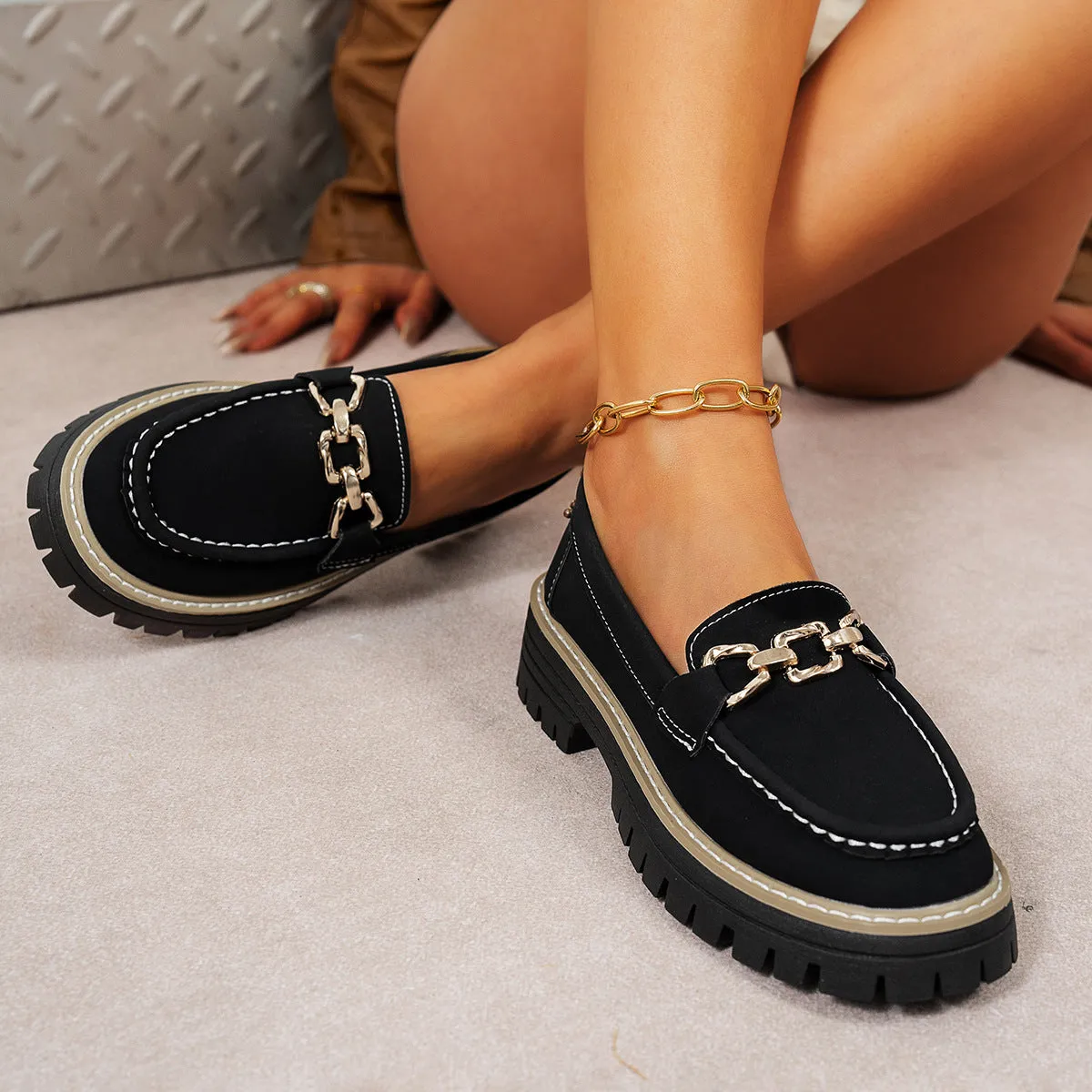 Women's flat bottom loafers with a thick platform heel in a solid colour, PU upper, and round toe shape.