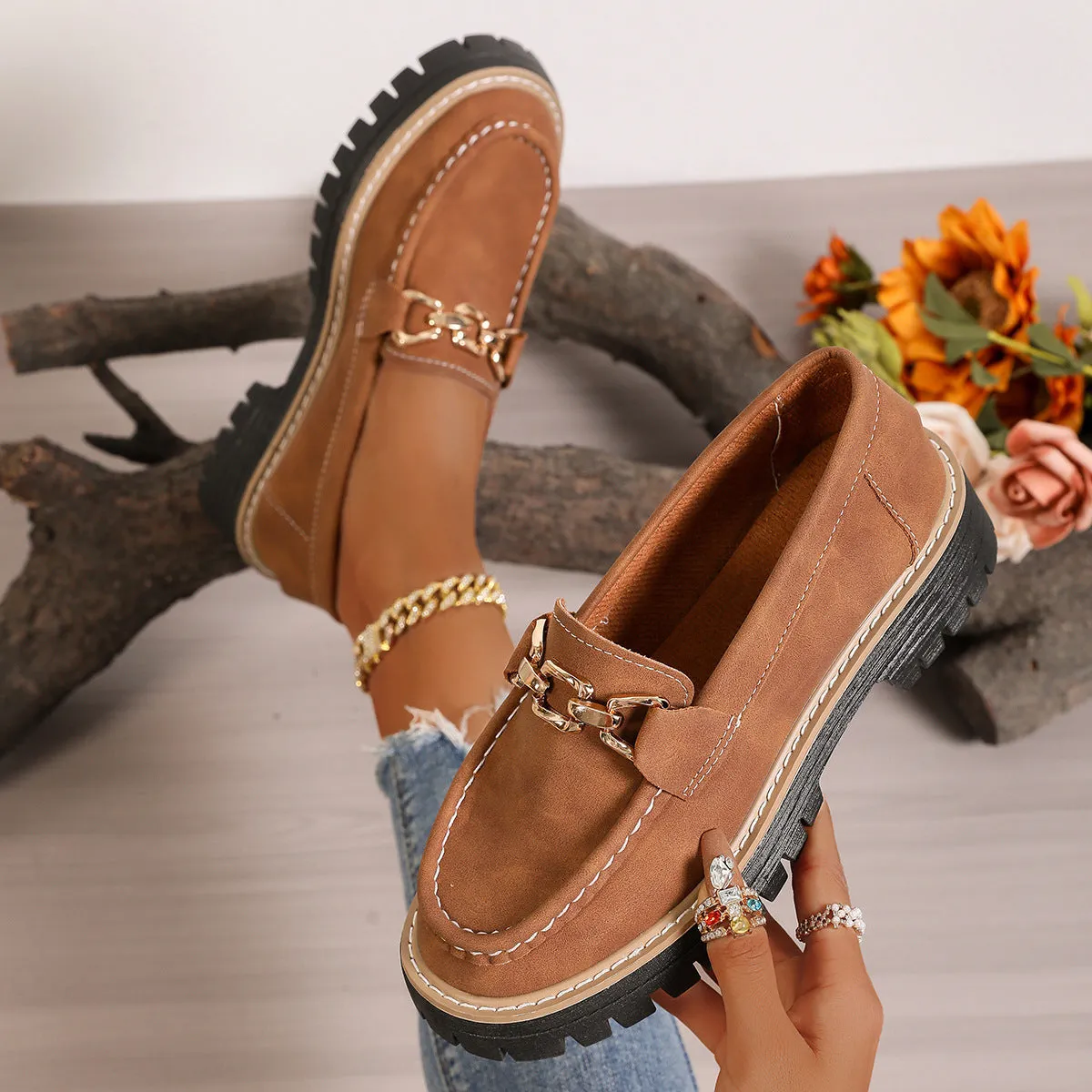 Women's flat bottom loafers with a thick platform heel in a solid colour, PU upper, and round toe shape.